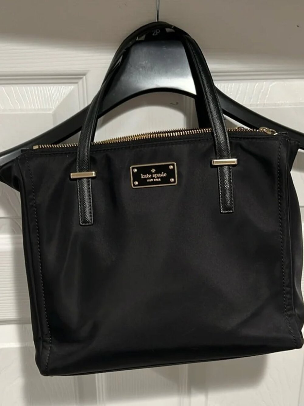 Kate Spade medium size hand bag in classic black fabric